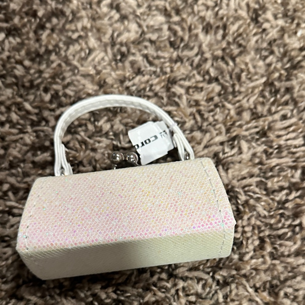 Mini sparkly purse.
